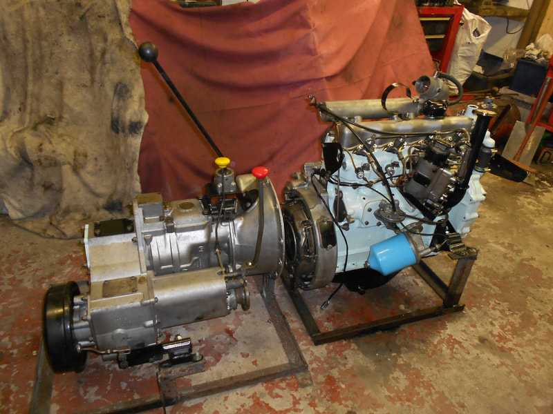 Land Rover Series Diesel engine and gearbox ready to be mated.