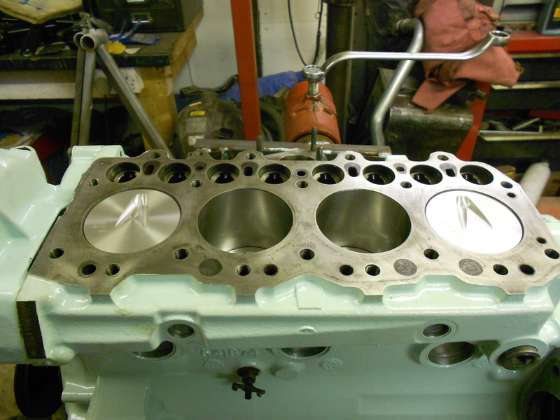 Painted and cleaned Land Rover Series 3 Diesel engine block after reboring and new pistons fitted.