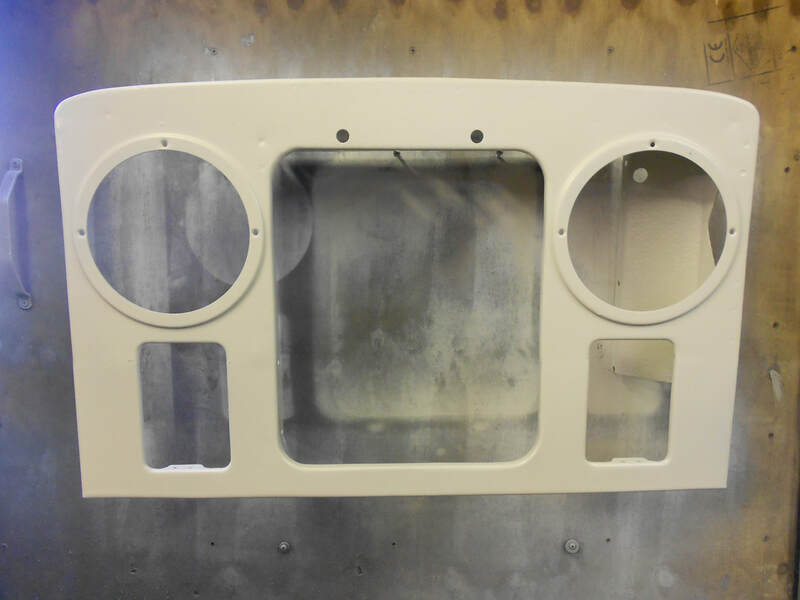 Front view of a restored and primed Land Rover Series 2 Front Panel.