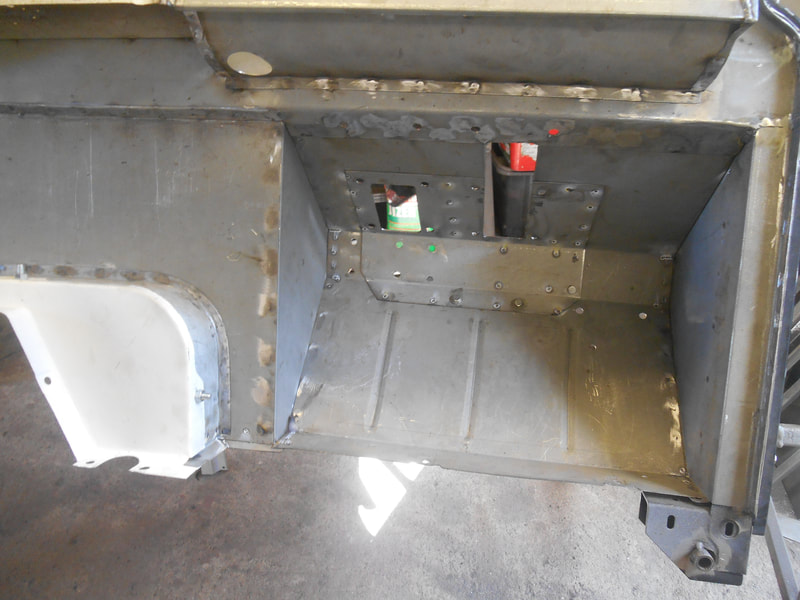 Newly modified and fitted off side foot well on a Land Rover Series 2a bulkhead.