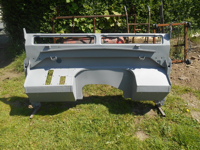 Restored and primed Land Rover Series 2a bulkhead viewed from the front.