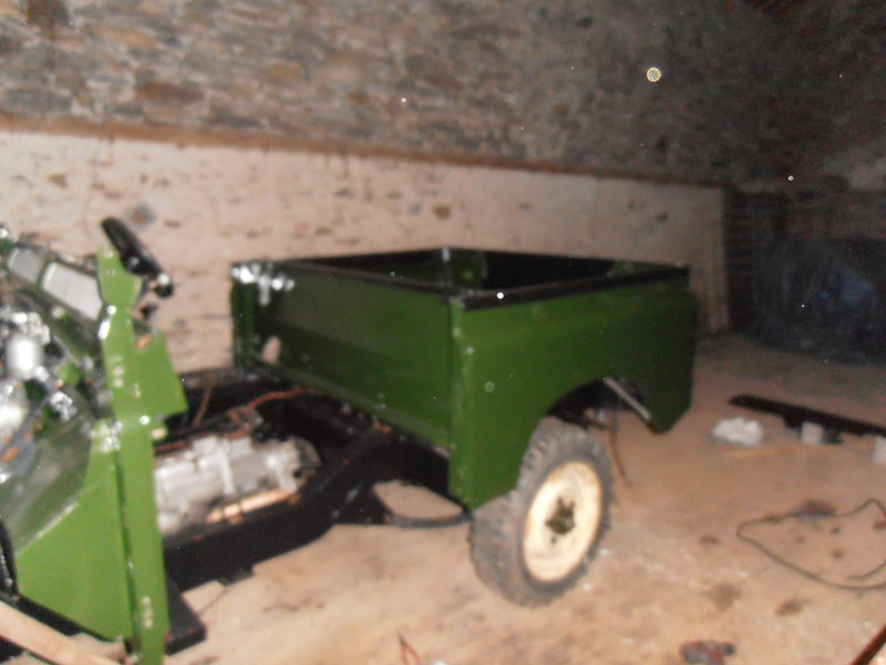 Green Tub and bulkhead added to Land Rover Series 2a black chassis.