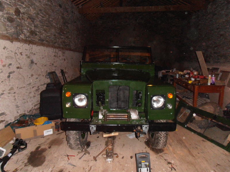 Front view of Green Land Rover Series 2a with both wings, front panel and bonnet fitted.