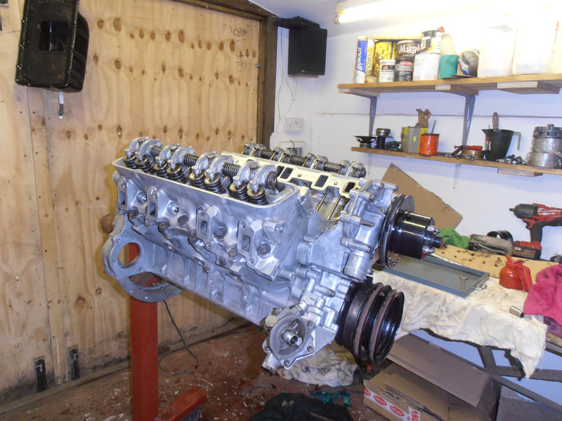 Rover V8 engine block with cylinder head fitted.